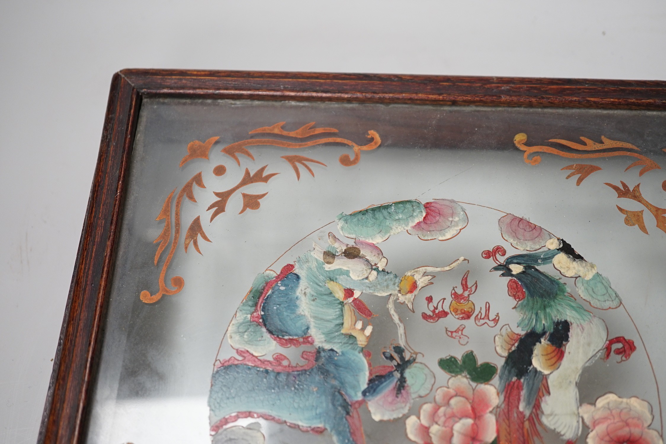 A Chinese reverse glass painting and a box cover with reverse painted glass panel